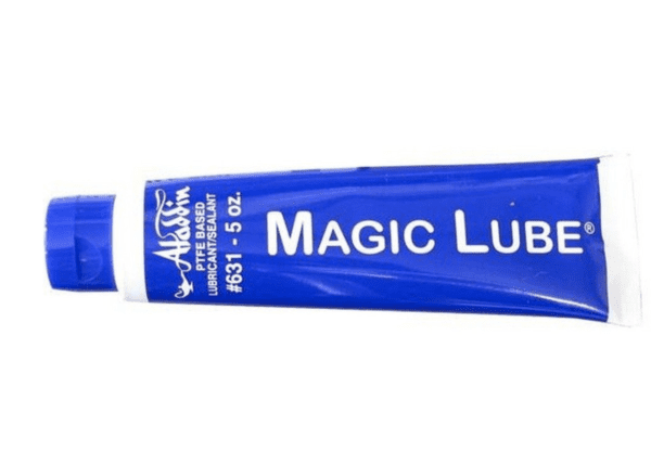 A tube of Aladdin Magic Lube 5oz Teflon Lubricant / Sealant 631 on a white background.